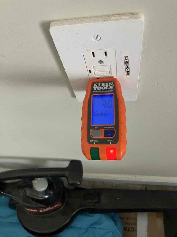 Responded to multiple non-functioning outlets in kitchen and master bedroom areas of a 2021 home. Verified breaker status and tested GFCI outlet under kitchen sink serving garbage disposal circuit using digital voltage tester. Identified tripped GFCI as source of power loss affecting downstream outlets in kitchen and master bath/bedroom areas. Reset GFCI outlet, restored power to all affected receptacles, and verified proper operation of disposal circuit and connected outlets throughout affected zones.