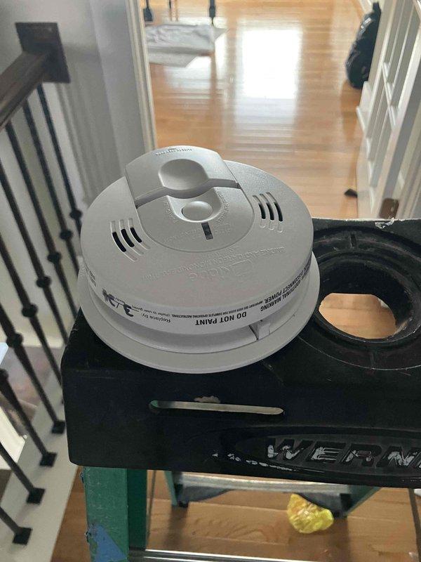 Completed comprehensive 32-point electrical system evaluation on 2016 residential property. Performed electrical panel maintenance including torque verification and connection inspection of all breakers and bus bar terminals. Tested all GFCI shock protection outlets and breakers for proper ground fault functionality, verified arc fault circuit interrupter breakers for fire protection compliance. Conducted smoke and carbon monoxide detector maintenance including battery replacement and operational testing. Replaced customer-supplied light bulbs in fixtures up to 12 feet and cleaned ceiling fans within accessible height range. All systems tested and confirmed operational with no deficiencies noted.