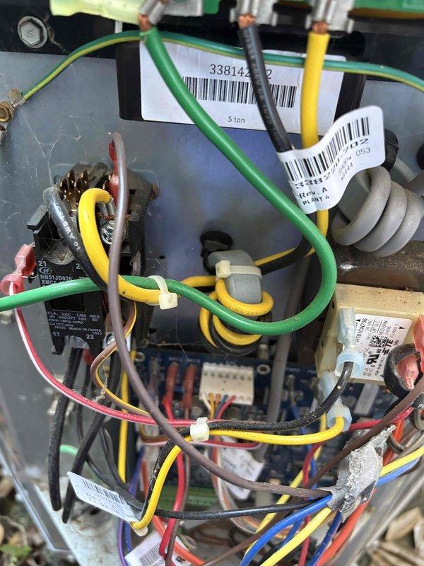 Replaced defective inverter board on 5-ton HVAC unit. Disconnected existing wiring harness from failed control board, removed old inverter assembly from electrical panel, and installed new replacement board. Reconnected all power and control wiring to proper terminals, verified secure connections at capacitors and control circuits, and tested system operation to confirm successful repair.