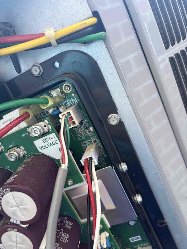 Replaced defective inverter board on 5-ton HVAC unit. Disconnected existing wiring harness from failed control board, removed old inverter assembly from electrical panel, and installed new replacement board. Reconnected all power and control wiring to proper terminals, verified secure connections at capacitors and control circuits, and tested system operation to confirm successful repair.