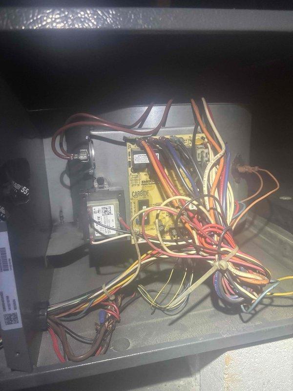 Completed comprehensive heating and air maintenance on 2014 system including full 80-point inspection, outdoor coil cleaning, burner cleaning, gas pressure adjustment, and safety inspections. Accessed control panel to inspect HVAC control board, electrical connections, and wiring harnesses; verified all components functioning properly. Inspected air handler unit, ductwork connections, and access panels to ensure proper system operation and safety compliance.