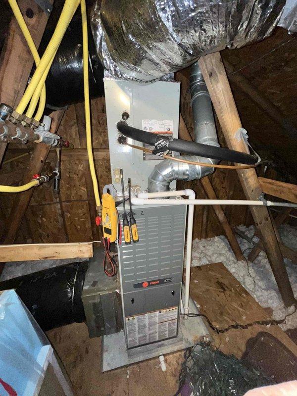 Completed comprehensive heating and air maintenance on one 2012 HVAC system including full 80-point inspection of both indoor furnace unit and outdoor condensing unit. Performed outdoor coil cleaning to remove debris and vegetation buildup, burner assembly cleaning, and gas pressure testing with adjustments to manufacturer specifications. Conducted complete safety inspection verifying proper electrical connections, refrigerant lines, condensate drainage, and all operational controls. All systems tested and confirmed operating within normal parameters. Customer has second unit that will be enrolled for future maintenance coverage.