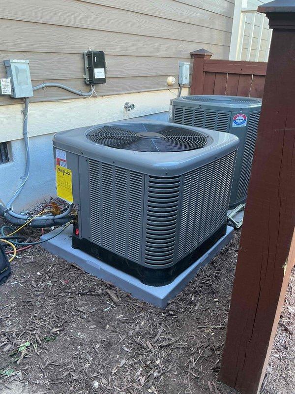 Completed full HVAC system replacement consisting of Rheem RA16AY24AJ2NA 2-ton 16 SEER2 two-stage condenser with R-454B refrigerant, RCFY2417STANMC 2-ton N-coil cased evaporator with TXV, and R962V0603A17M4SCAP 96% AFUE 60,000 BTU two-stage gas furnace with variable speed ECM motor. Removed and properly disposed of existing equipment from premises. Installed new composite outdoor condenser pad and positioned condenser unit with proper electrical disconnect and connections. Replaced air handler plenum and associated collars to accommodate new equipment specifications. Installed air scrubber for enhanced indoor air quality. Mounted condensate pump in attic space with purple PVC drainage lines and float switch for overflow protection. Completed all refrigerant line connections, electrical wiring, and ductwork transitions. Performed complete system startup, verified proper operation of two-stage heating and cooling functions, confirmed variable speed blower motor operation, tested condensa