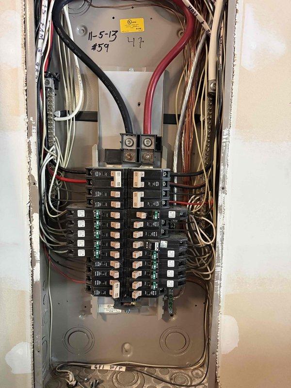 Responded to a loss of power affecting multiple outlets in a single room following a tripped breaker incident caused by an air fryer. Upon arrival, verified that all breakers were in the reset position but outlets remained de-energized while other circuits, lighting, and major appliances operated normally. Investigated the electrical panel and affected outlet circuits, identifying a failed GFCI receptacle or line-side connection issue preventing power distribution to downstream outlets. Accessed and inspected the electrical components, including terminal connections and wiring integrity, documented the installation with photographs, and restored power to all affected receptacles in the room.