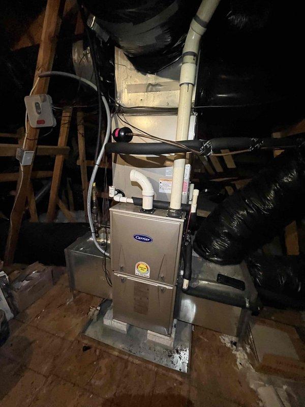 Completed comprehensive heating and air maintenance on 2013 Carrier furnace system located in attic space. Performed 80-point inspection on unit, cleaned outdoor coils and burner assembly, verified and adjusted gas pressures to manufacturer specifications, and conducted full safety inspection of all system components including ductwork, electrical connections, condensate drainage, and venting systems. All equipment found operating within normal parameters upon completion of preventive maintenance service.