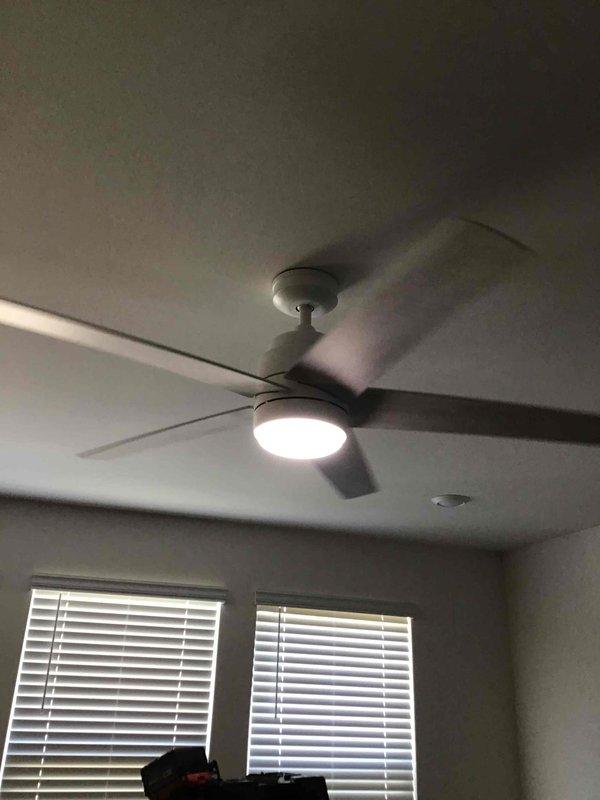 Installed four ceiling fans with integrated lighting fixtures in interior rooms with 9-foot ceilings. All fixtures were mounted to standard drywall construction, wired to existing electrical circuits, and tested for proper operation of both fan motor and light components. Installation confirmed operational with all units functioning correctly.