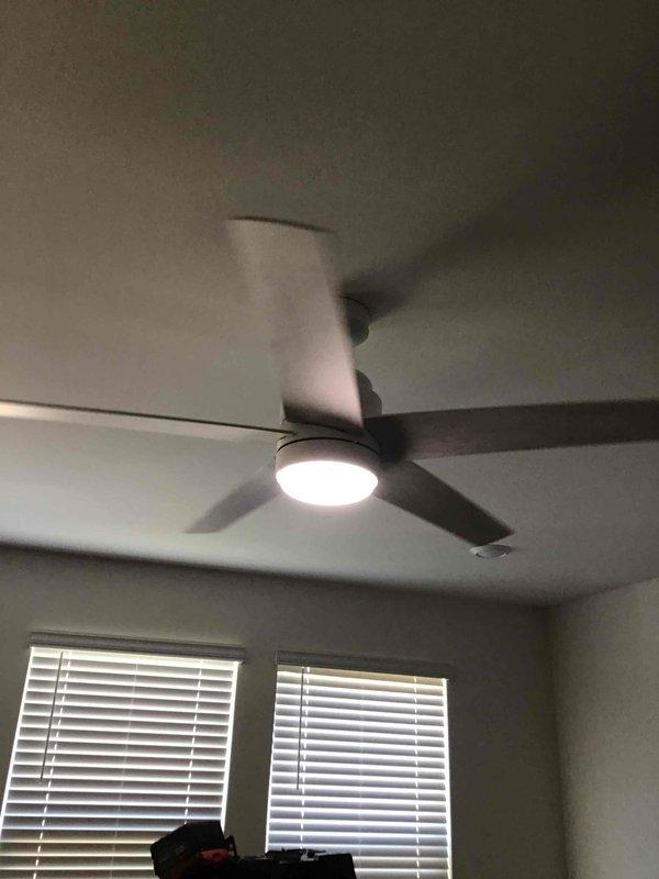 Installed four ceiling fans with integrated lighting fixtures in interior rooms with 9-foot ceilings. All fixtures were mounted to standard drywall construction, wired to existing electrical circuits, and tested for proper operation of both fan motor and light components. Installation confirmed operational with all units functioning correctly.