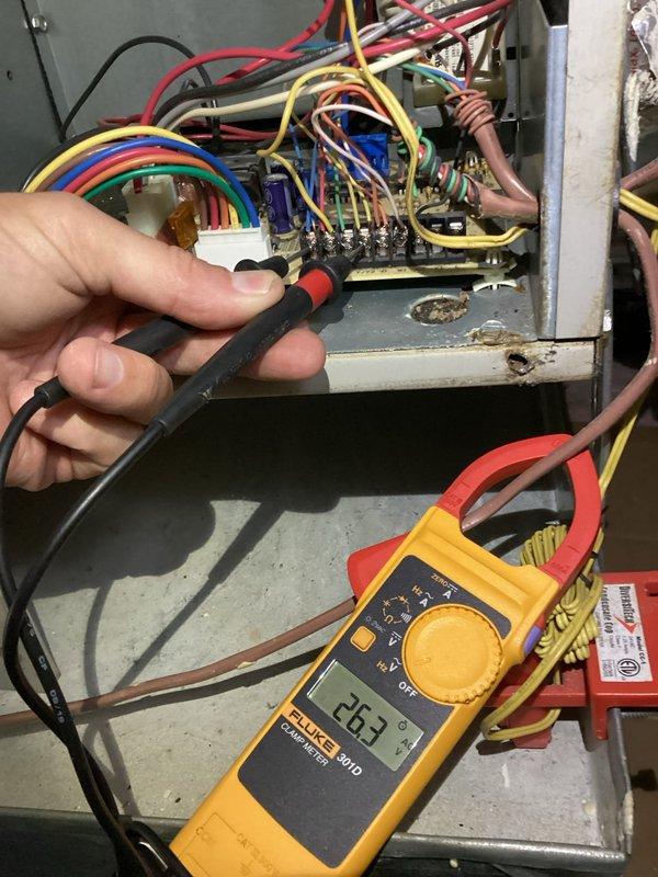 Responded to no cooling complaint on 5-year-old system with reports of evaporator coil freezing and hot air discharge. Performed comprehensive electrical diagnostics using clamp meter to test voltage and amperage at contactor and control panel components. Troubleshot wiring connections, tested compressor circuit, and verified proper electrical supply to outdoor unit after customer reported multiple previous service calls without resolution.