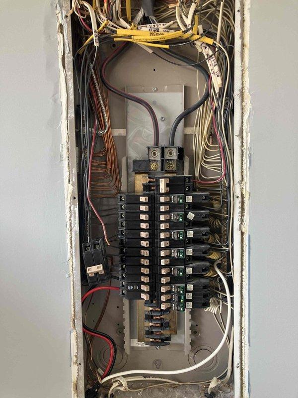 Responded to intermittent power issue affecting first-floor laundry room dryer outlet in 2012 home. Inspected electrical panel and verified breaker operation, finding intermittent connection causing dryer to power on then immediately shut off with no-power error code. Diagnosed and resolved faulty connection at dryer receptacle, restoring consistent power supply to appliance.