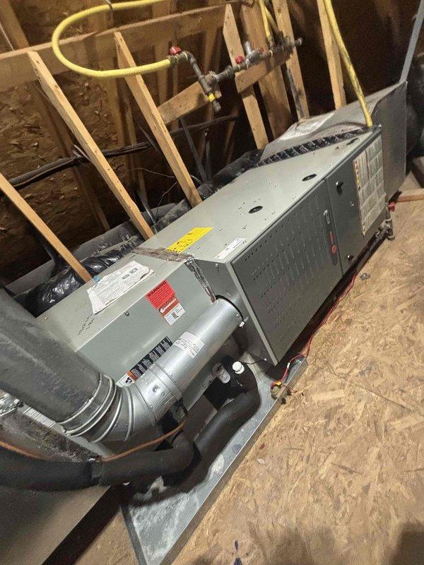 Responded to no cooling complaint on upper level air handler system. Upon arrival, diagnosed intermittent power cycling issue affecting thermostat operation. Performed electrical diagnostics using clamp meter to verify amperage draw and voltage supply at air handler located in attic space. Identified and resolved power supply issue causing unit to cycle on and off unexpectedly. Verified proper system operation with stable amperage readings of 77.4A and confirmed unit maintaining consistent power to thermostat. System restored to normal cooling operation with no further cycling issues observed.
