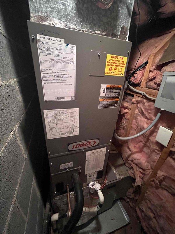 Completed comprehensive heating and air maintenance including 80-point inspection on both HVAC units. Performed outdoor coil cleaning, burner cleaning, and verified gas pressures using digital manometer, with readings at 0.35" W.C. confirming proper system operation. Conducted thorough safety inspections on Lennox unit located in attic space over garage, checking all electrical connections, controls, and operational components to ensure safe and efficient system performance.