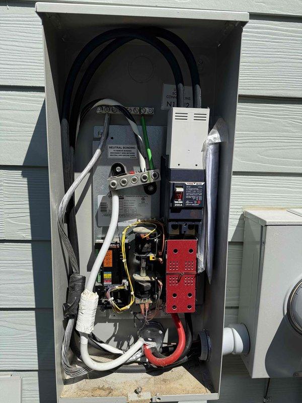 Conducted site assessment for EV charger installation in garage of 2021 home. Evaluated existing electrical service panel and main disconnect located in garage, confirming adequate capacity and proper grounding for Level 2 charging circuit. Documented current electrical infrastructure including service entrance equipment, meter base, and panel configuration to determine optimal installation pathway for customer-provided charging unit.