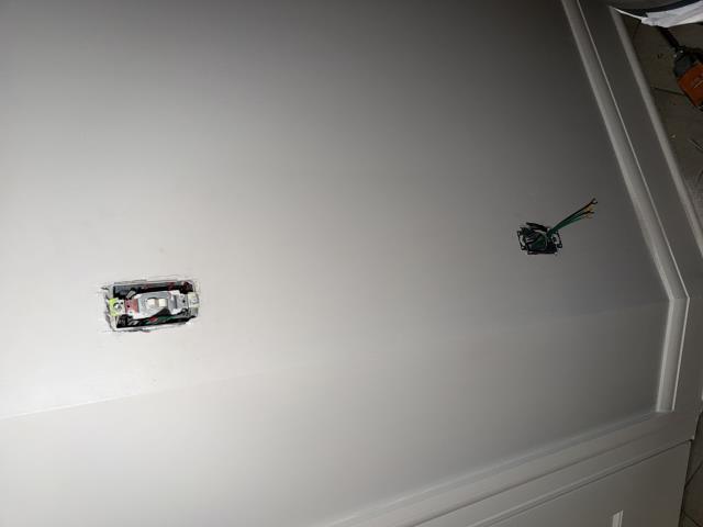 I installed a GFCI outlet near the fan/light outlet. I cut sheetrock and ran M/C cable from switches to receptacles. I ensured safety and compliance with electrical standards.