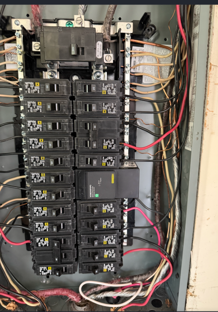 We replaced an old electrical panel with a new 100 AMP main breaker panel, ensuring it meets NEC standards. The old fused ITE panel was removed and the new system was installed.