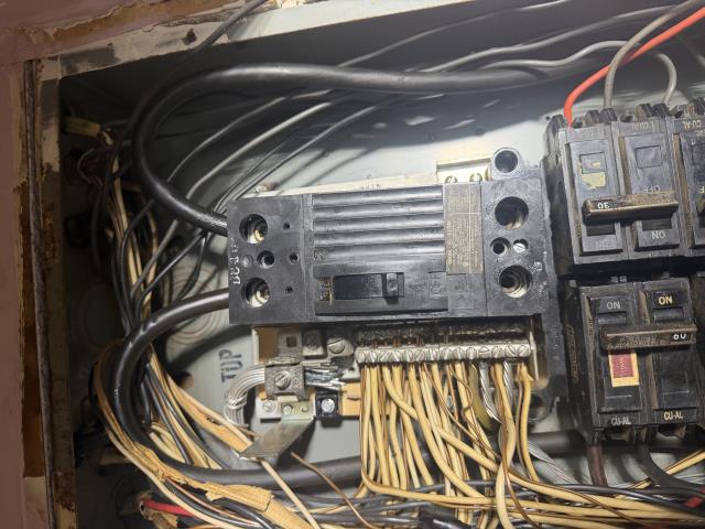 I replaced the main breaker for a club member, ensuring safety and compliance with electrical standards.