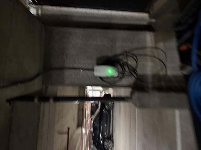 I extended a 40 amp circuit for a BMW EV charging station, ensuring a dedicated bottom entry. I also installed a 4-inch LED wafer light for enhanced visibility.