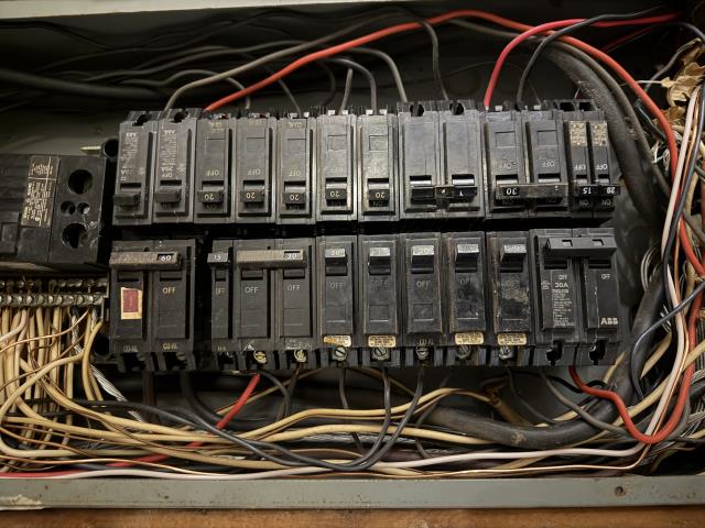 I tested and traced voltages at the panel, identified the affected bedroom and hall circuits, and replaced the faulty breaker to restore power.