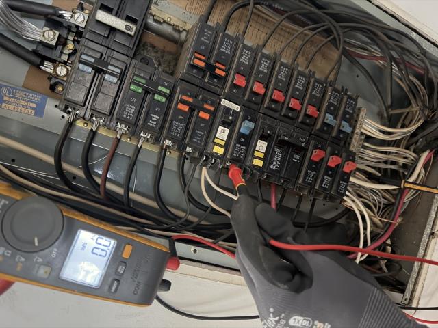 I tested and traced voltages at the panel, identified the affected bedroom and hall circuits, and replaced the faulty breaker to restore power.
