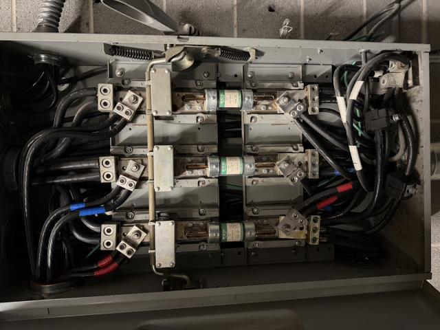 I replaced a 400 amp fuse in the main disconnect, installed a new one, tested the voltage, and confirmed proper operation. The system is now functioning correctly.