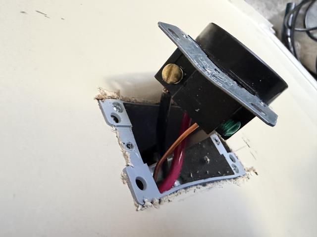 After an EV installation, I addressed a main breaker tripping issue. I discovered loose connections at the main breaker and the NEMA 14-50R outlet, along with an improperly rated outlet in a single gang box.