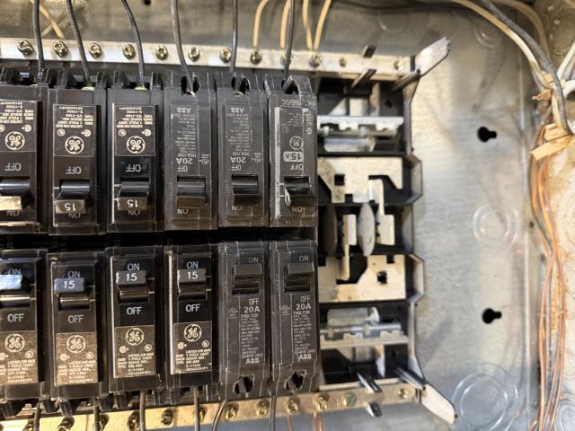 I replaced a non-compliant 30 amp breaker with a Siemens breaker in a GE panel, ensuring compliance with electrical codes and enhancing safety.