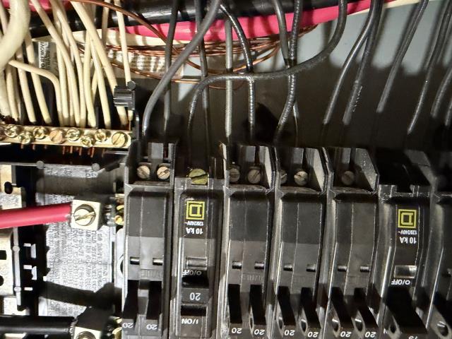 We installed a tandem breaker to replace a double-tapped one, ensuring compliance with electrical codes. We separated the circuits, tested the system, and verified everything was functioning correctly.