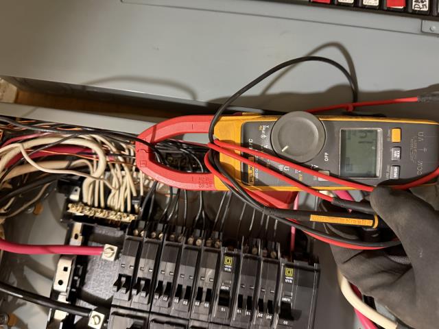 We installed a tandem breaker to replace a double-tapped one, ensuring compliance with electrical codes. We separated the circuits, tested the system, and verified everything was functioning correctly.