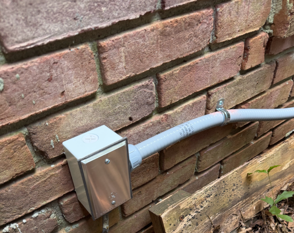 We installed a 110V indoor outlet within 5 feet of the power source, dedicated to a sump pump. This outlet is located below the basement window and is on a 20-amp circuit, ensuring reliable operation.