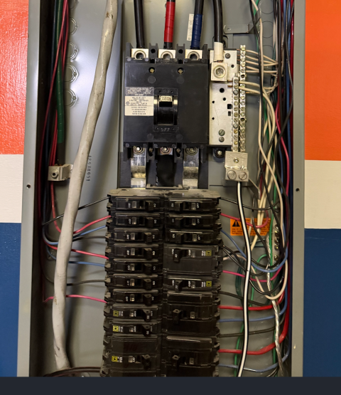 I installed a dedicated circuit for a single room. I addressed an electrical panel issue by reseating the breakers and securing them with buss point screw covers.