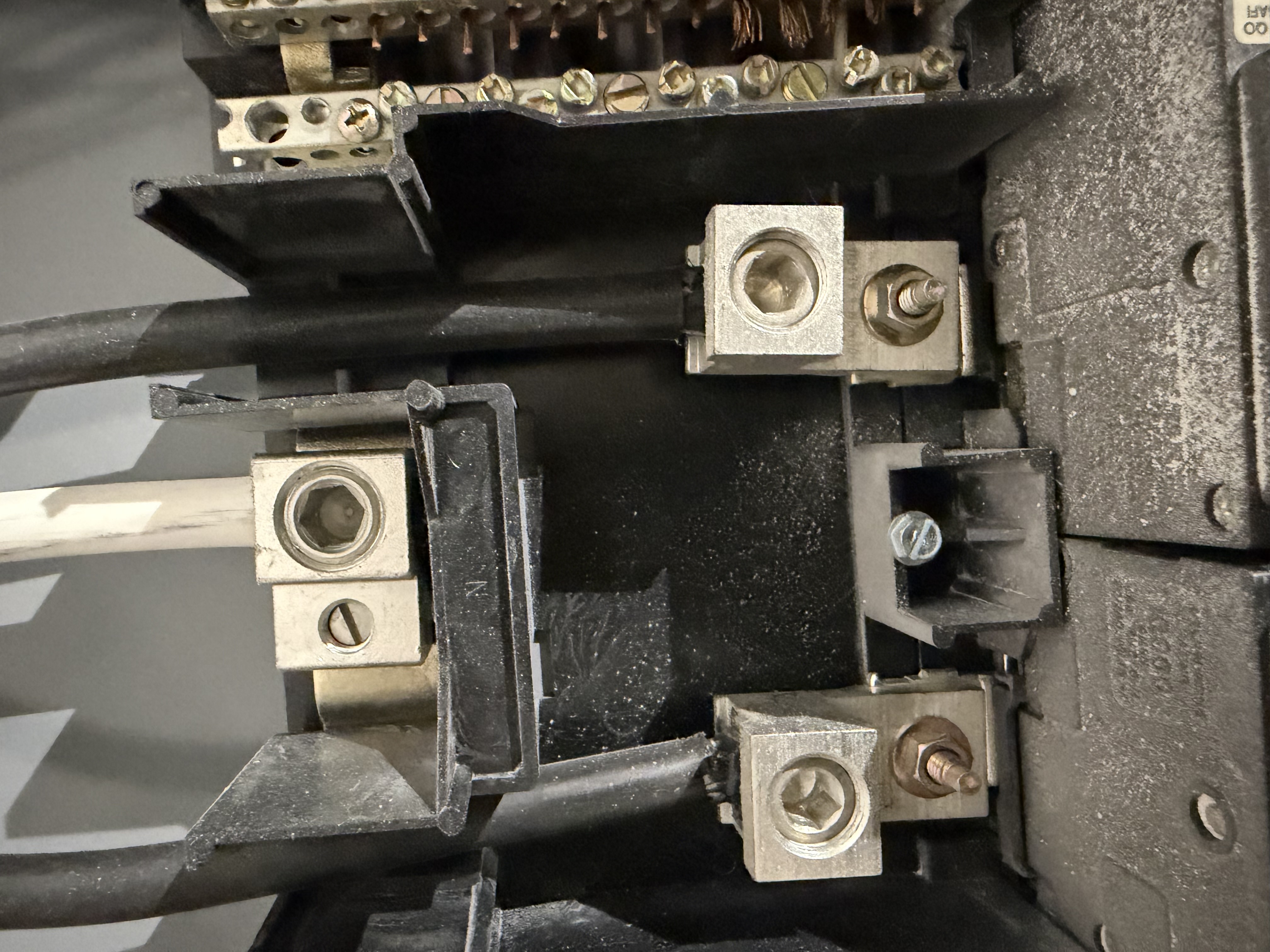 I checked the electrical panel, buss bars, and OCODs for issues. I installed a junction box for a bathroom heated floor system and ran conduit for communication wiring.
