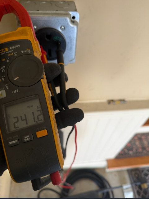 We installed a 40 amp EV circuit at 240 volts, securely mounted it, and connected the conductors. We also mounted the EV nema 14-50r outlet, junction box, and EV mount holster. Finally, we tested and confirmed the correct voltage.
