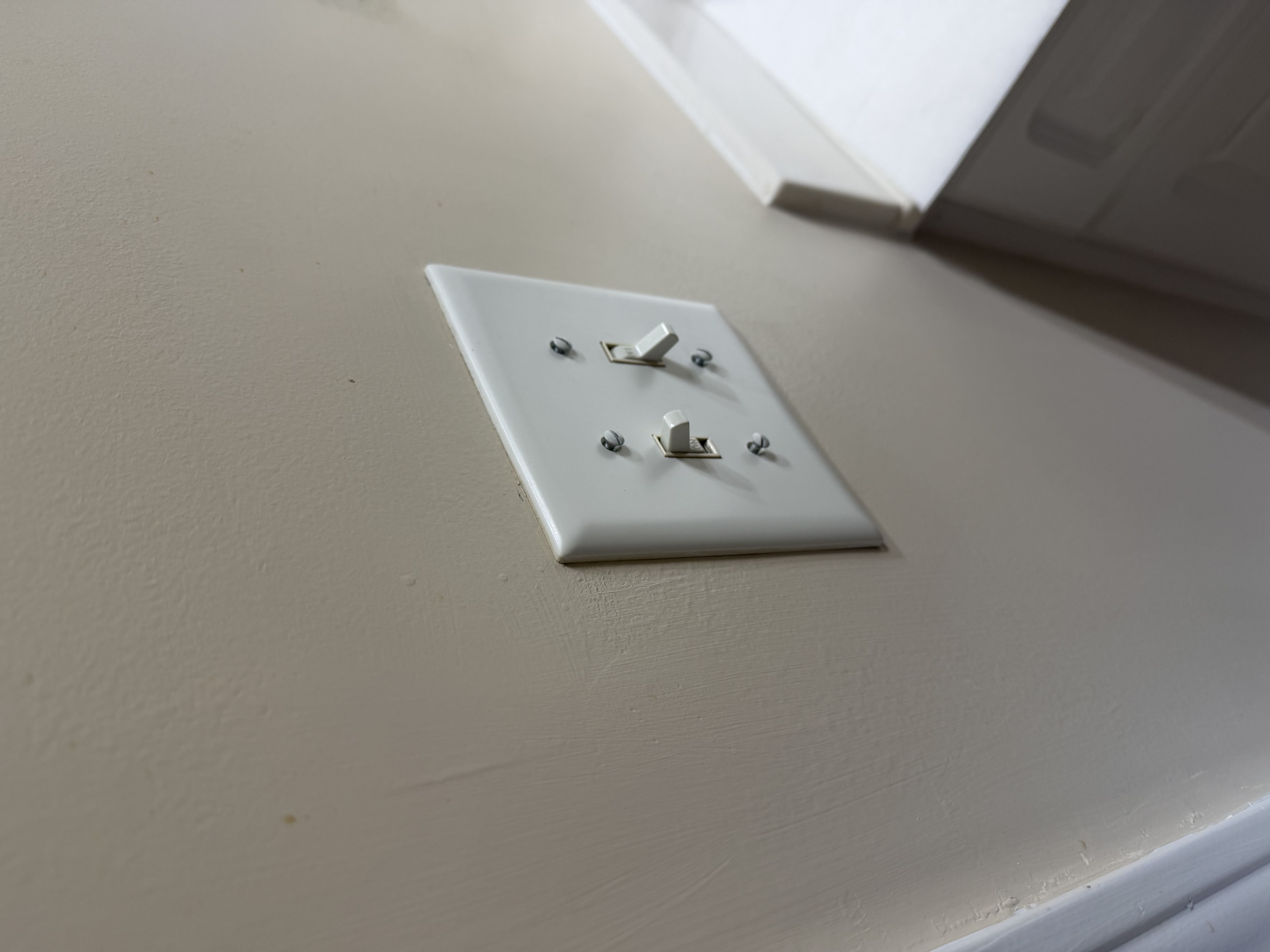 A flickering light in the bathroom was resolved by identifying a faulty switch and replacing it with a new one, ensuring safe and reliable lighting.