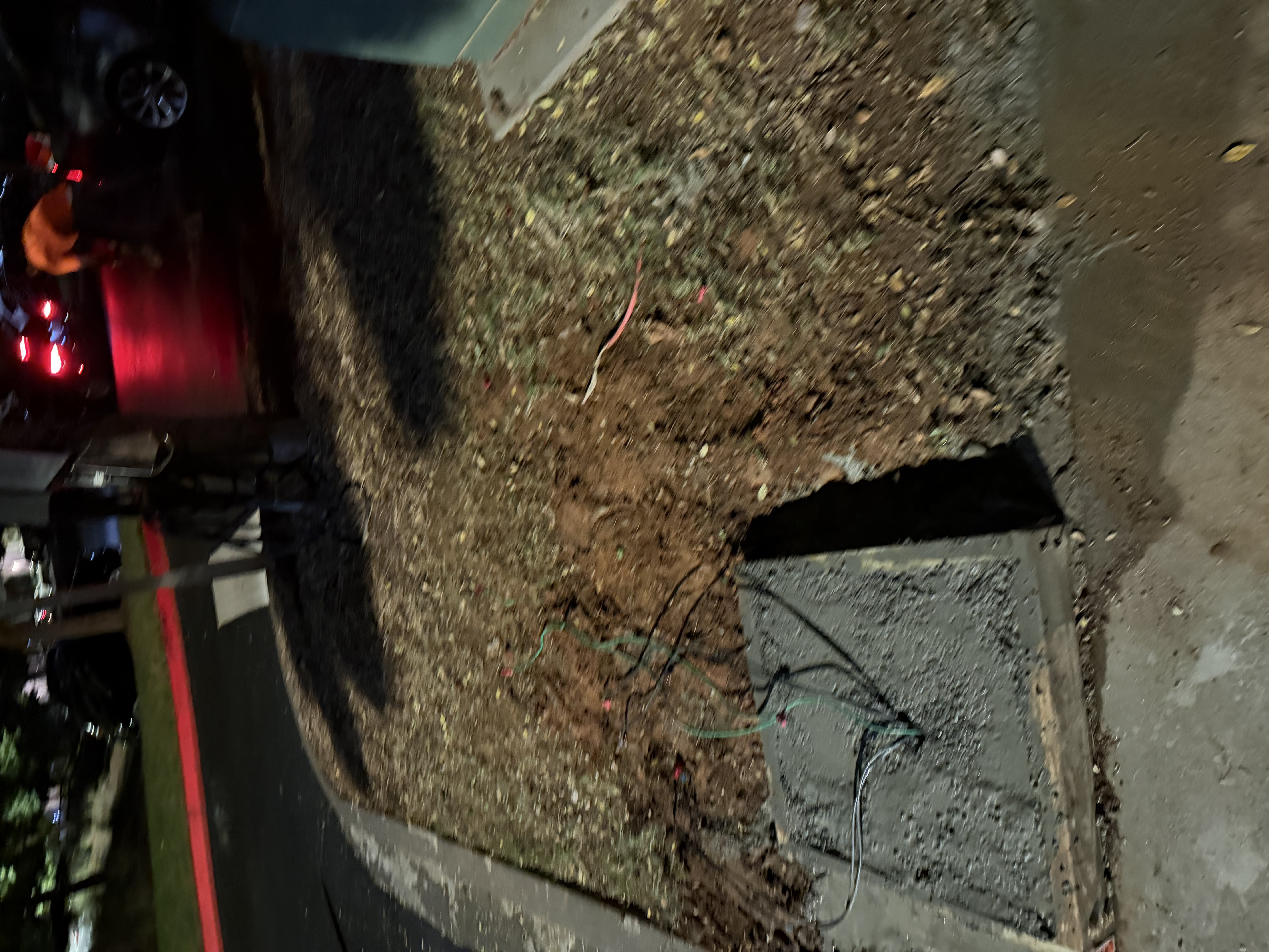 I removed the old electric vehicle charging stations, poured a new concrete pad, and ensured it was properly cured before installing the new EV infrastructure.