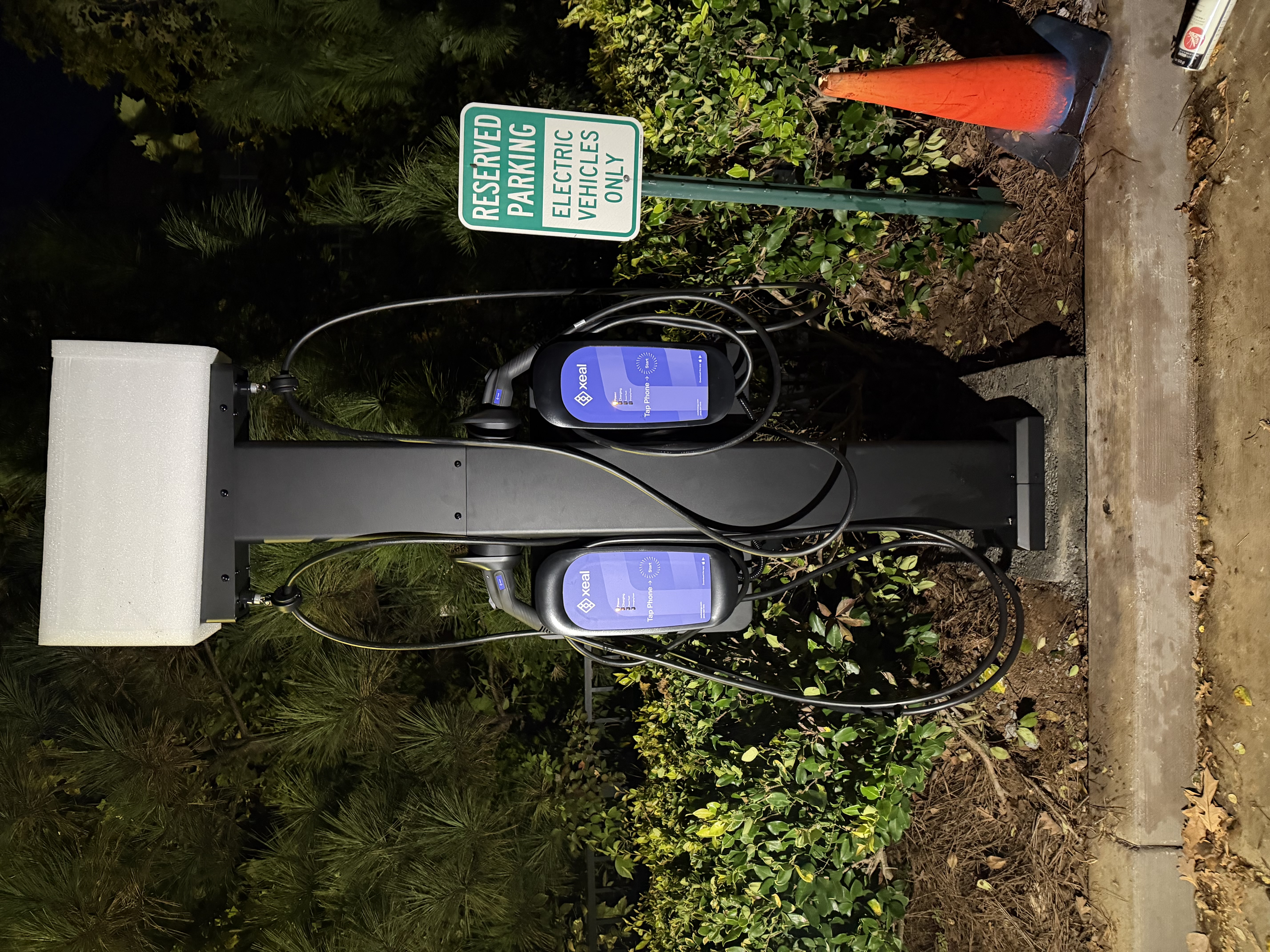 I removed the outdated Sema EV charging station, installed a new Xeal unit with Bluetooth connectivity, and ensured it was fully operational. The new station is now ready for use.