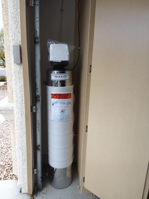 Technician arrived onsite. Had to remove shelving and cut 2 holes in the cabinet to fit new piping through. Installed HALO 5 with new 1" PRV. Ran 1/2" backwash line. Started the system on a cycle wash and no leaks. Hawthorne PHC job complete. 