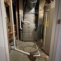 Carrier gas furnace installation at customer's home. Price includes new furnace, thermostat, required venting, required electrical, required gas piping, required duct adjustment, removal of old equipment, tax and installation complete. 