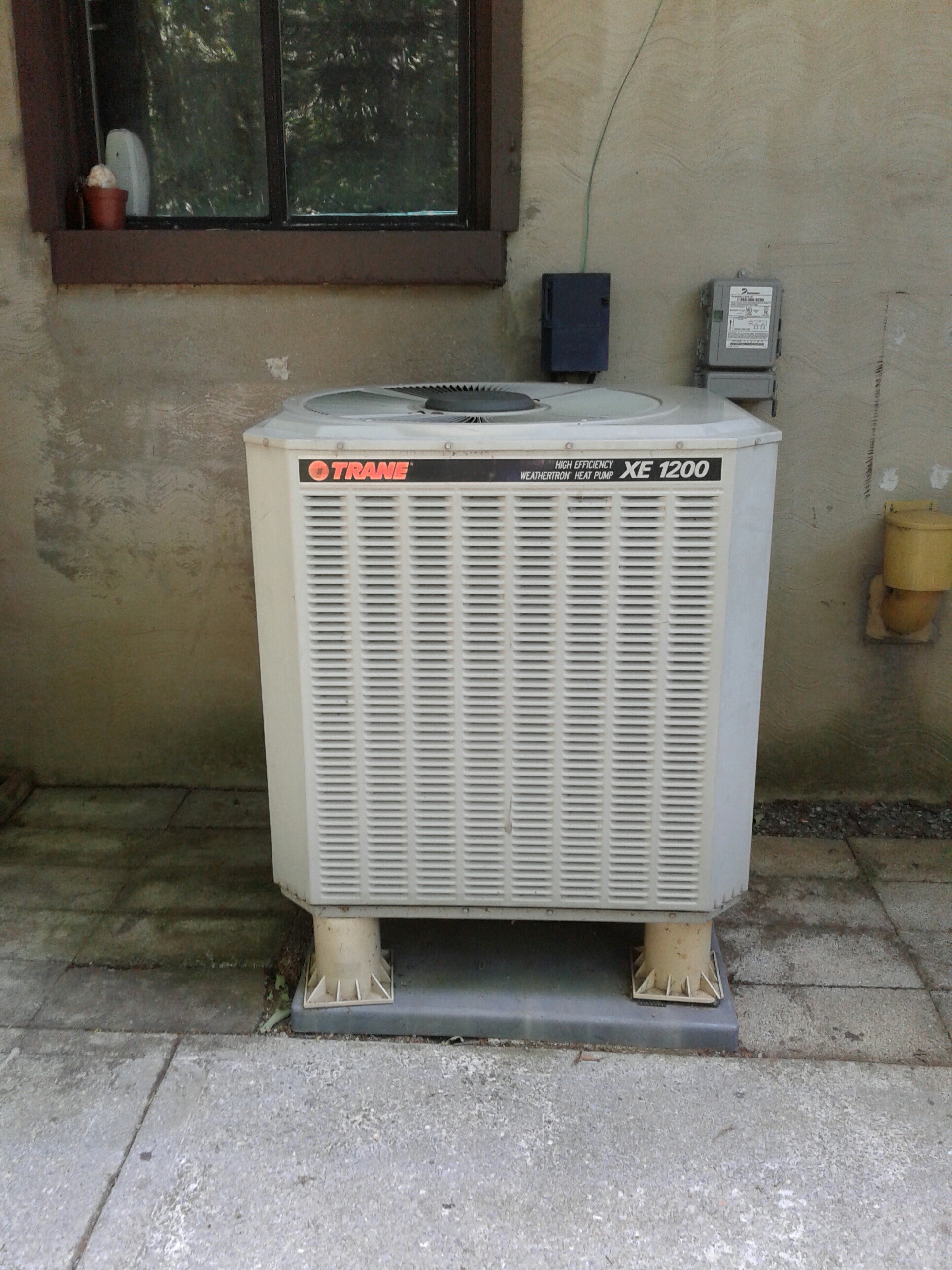 Replaced condenser fan motor, fan blade with a new capacitor on a 1998 Trane heat pump system.