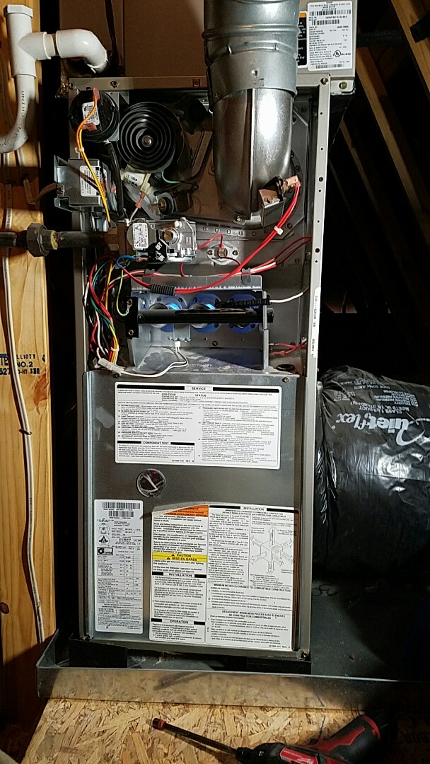 Install new blower motor in this Carrier gas furnace. 