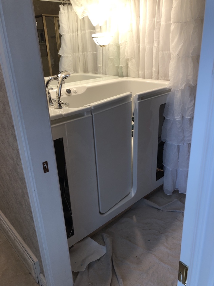 Lakewood, CO - Installing a Kohler wall in bathtub. It’s a temporary installation to be relocated in the home at a future time Lakewood, CO - Installing a Kohler wall in bathtub. It’s a temporary installation to be relocated in the home at a future time