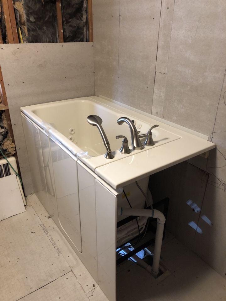 Colorado Springs, CO - Installing a Kohler Walk In Bathtub this morning as part of a complete bathroom remodel Colorado Springs, CO - Installing a Kohler Walk In Bathtub this morning as part of a complete bathroom remodel