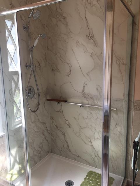 Fort Collins, CO - After photo of Kohler Shower System install with floating shelf Fort Collins, CO - After photo of Kohler Shower System install with floating shelf