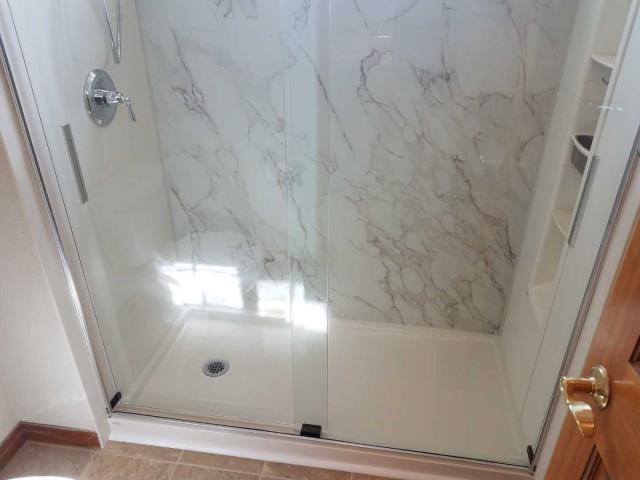 Thornton, CO - After photo of brand new Crosscut Dune Kohler Shower System with shower locker Thornton, CO - After photo of brand new Crosscut Dune Kohler Shower System with shower locker