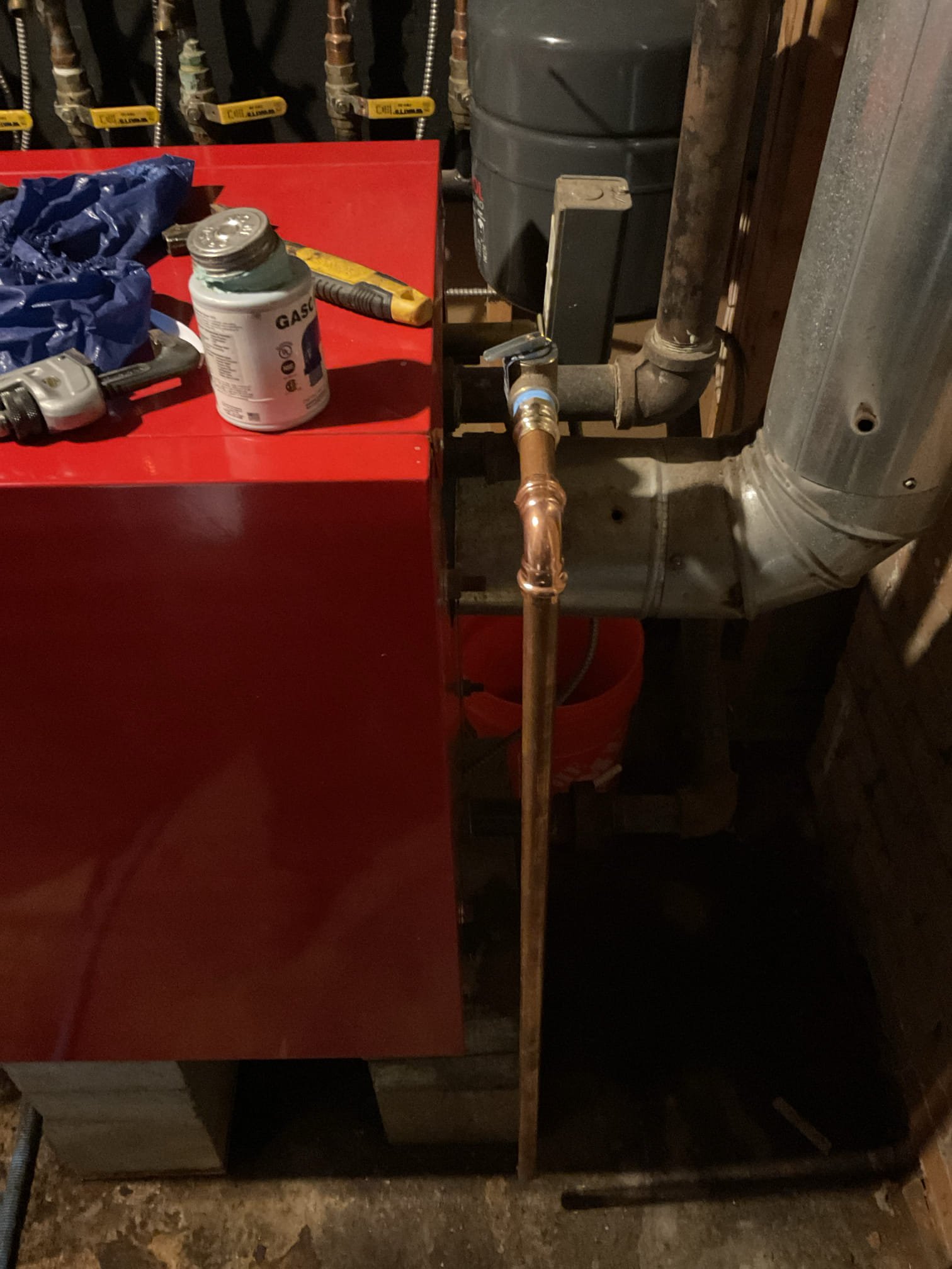 Upon inspection, we found the circulator gaskets leaking, the bolts rusted, and the boiler drain leaking. We replaced the gaskets and bolts on all three circulators and installed a new boiler drain to restore safe, reliable operation and prevent future leaks.

The existing thermal expansion tank and safety pressure relief valve were outdated and not functioning properly. Both were replaced to ensure safe, dependable operation of the heating system and to prevent potential water damage or overpressure issues. The new relief valve was positioned to stand vertically and piped to the floor in accordance with code requirements.

After completing all repairs, we purged the heating system, turned all ball valves back on, and ran all zones to verify proper operation. The system was thoroughly checked for leaks — none were present.