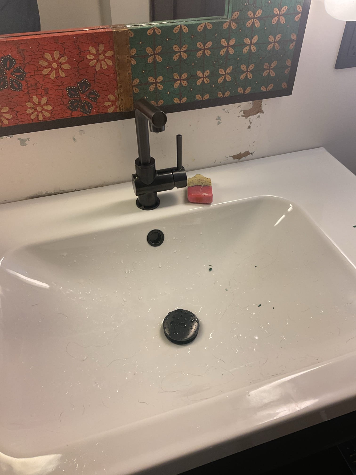 	•	Used a plunger and thrift to clear blockage in vanity drain line. Thoroughly tested the drain — confirmed proper operation and no leaks observed.
	•	Adjusted the vanity faucet, which had been installed incorrectly, so that it now faces the correct direction.
	•	Discussed installation of an outdoor wall hydrant that would run through the kitchen cabinet and exterior wall. The homeowner plans to renovate the kitchen, so installation of the spigot has been postponed until after renovation.
	•	The homeowner also requested to postpone adding water supply and drainage in the garage for a future dog wash station.