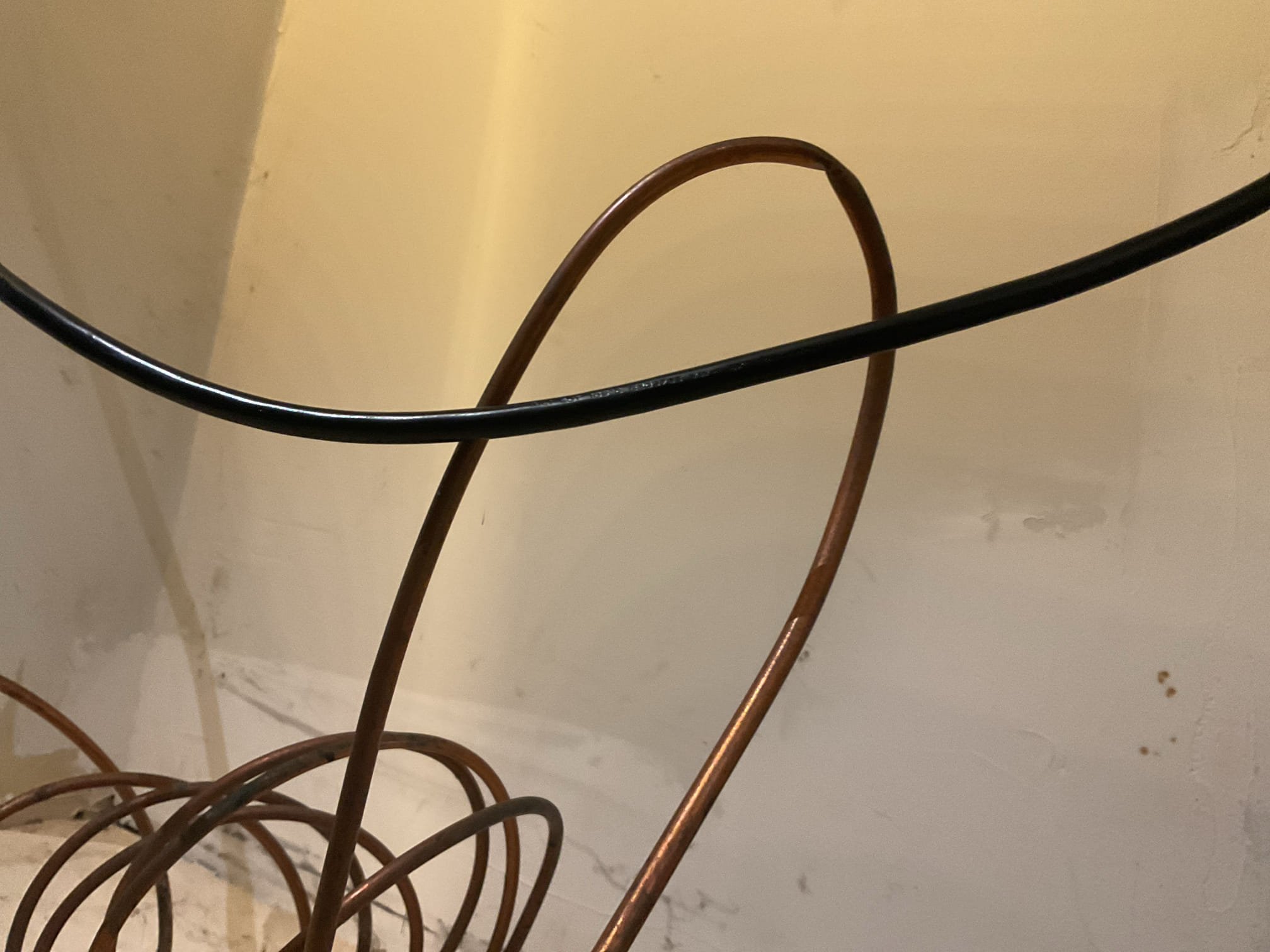 We removed two non–code-compliant saddle valves and a damaged section of ½” copper pipe that was crushed. A new ice maker ProPress stop valve was installed in their place. Additionally, we removed a small section of ¼” copper supply line that had a kink and a leaking compression fitting. The line to the refrigerator was reinstalled with a new compression fitting to ensure a proper, leak-free connection.