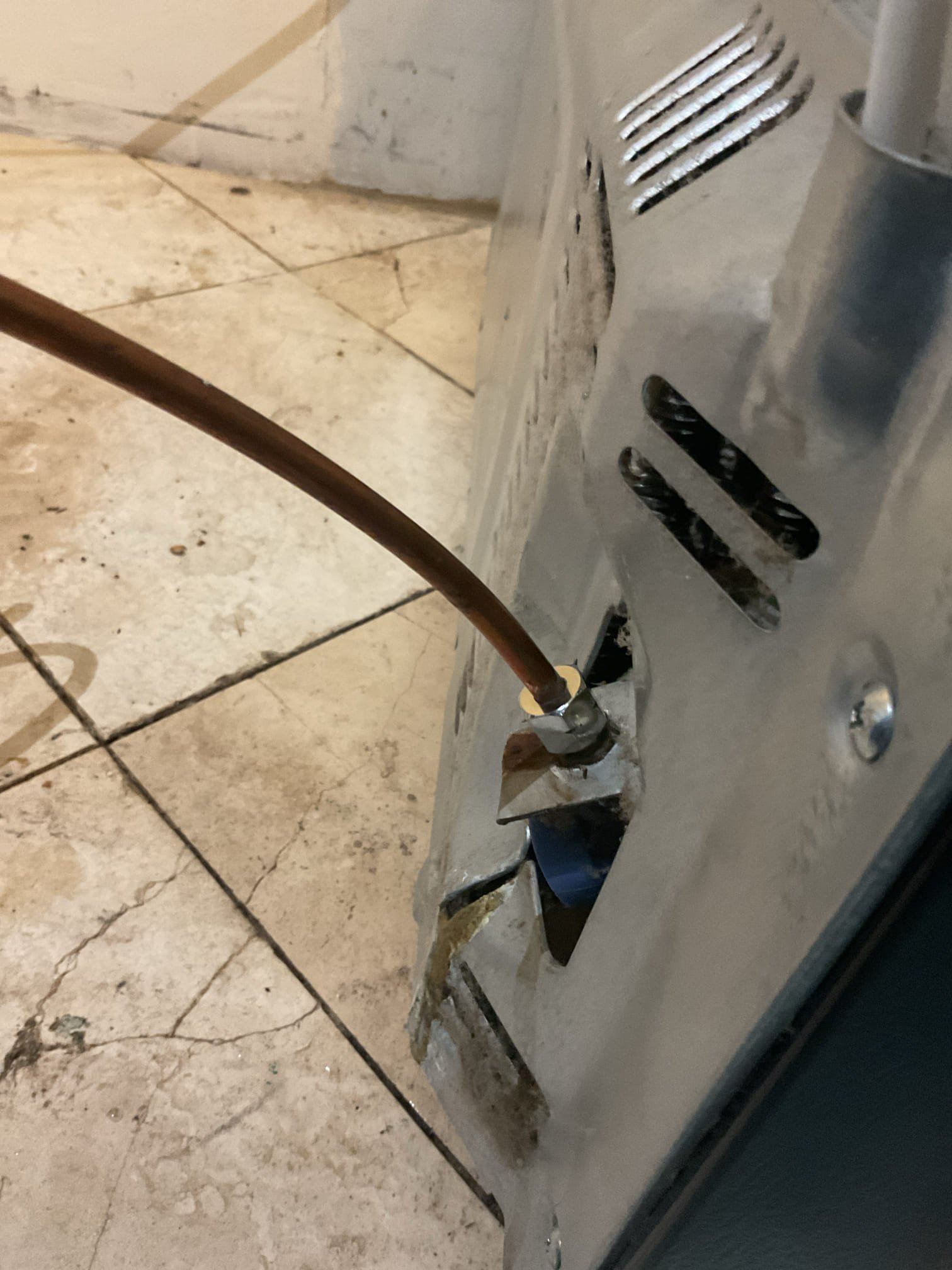 We removed two non–code-compliant saddle valves and a damaged section of ½” copper pipe that was crushed. A new ice maker ProPress stop valve was installed in their place. Additionally, we removed a small section of ¼” copper supply line that had a kink and a leaking compression fitting. The line to the refrigerator was reinstalled with a new compression fitting to ensure a proper, leak-free connection.