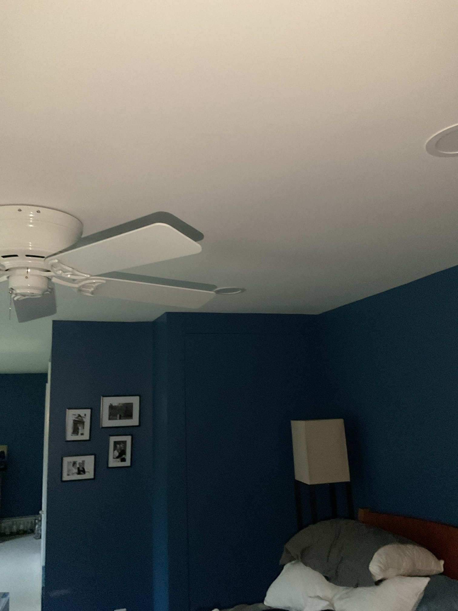 Upon arrival, we documented the damaged ceiling beneath the kitchen. The homeowner explained that only a few drops of water had fallen during the leak and that it was not enough to soak through the comforter on the bed it was dripping onto. They also noted that after vacuuming water from under the sink, the leak immediately stopped. All fittings and valves installed the previous day were inspected and confirmed to be dry with no signs of leakage. The homeowner also verified there were no leaks behind the refrigerator.

Attention was then directed to a blue-handled gate valve supplying the toe-kick heater, which was identified as the suspected source of the leak. After actuating the valve, it was confirmed to be leaking rapidly. We tightened the packing nut and cycled the valve multiple times to confirm the leak was fully resolved. In addition, we cleaned the pull-down faucet sediment screen to restore proper water flow at the kitchen faucet.