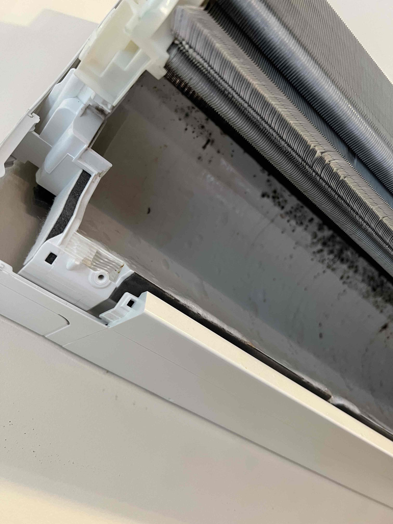 Performed annual tune up on a mini split system with 2 outdoors and 2 indoors. Cleaned the coils and enclosures of the outdoor units and inspected the electrical compartments—no signs of rodent activity were found. Cleaned the coils, enclosures, and filters of the indoor units, and inspected the condensate pans. Removed and cleaned the blower wheel from the Mitsubishi unit in the living room. Verified proper operation, system is functioning correctly at this time. 