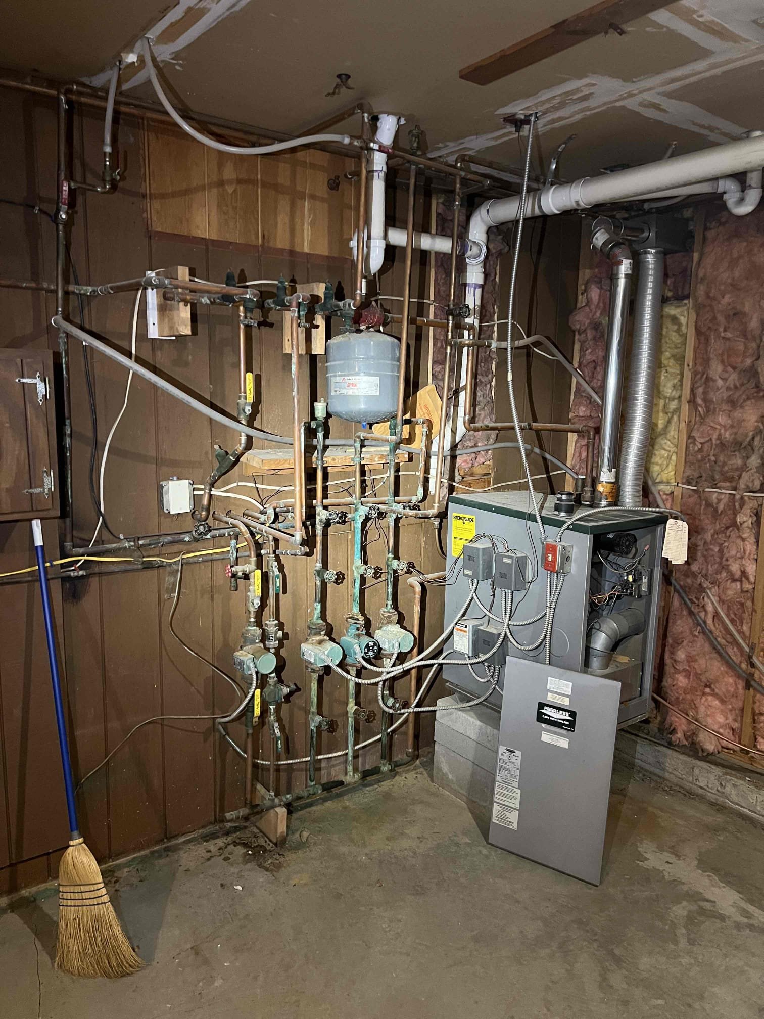 Arrived onsite to evaluate a propane boiler and HVAC system. The home has a 24-year-old Peerless boiler, a 19-year-old Rinnai tankless water heater, a mini split, and a central A/C system. The boiler has multiple issues and significant corrosion on the piping.

I informed them that we can service the HVAC system in the spring. They also expressed interest in adding heat to two sunrooms. We discussed several options, including baseboard heaters, room heaters, and mini splits.

They decided they would like estimates for replacing the boiler and water heater, as well as for adding heat to the sunrooms. We will follow up to schedule a consultation.