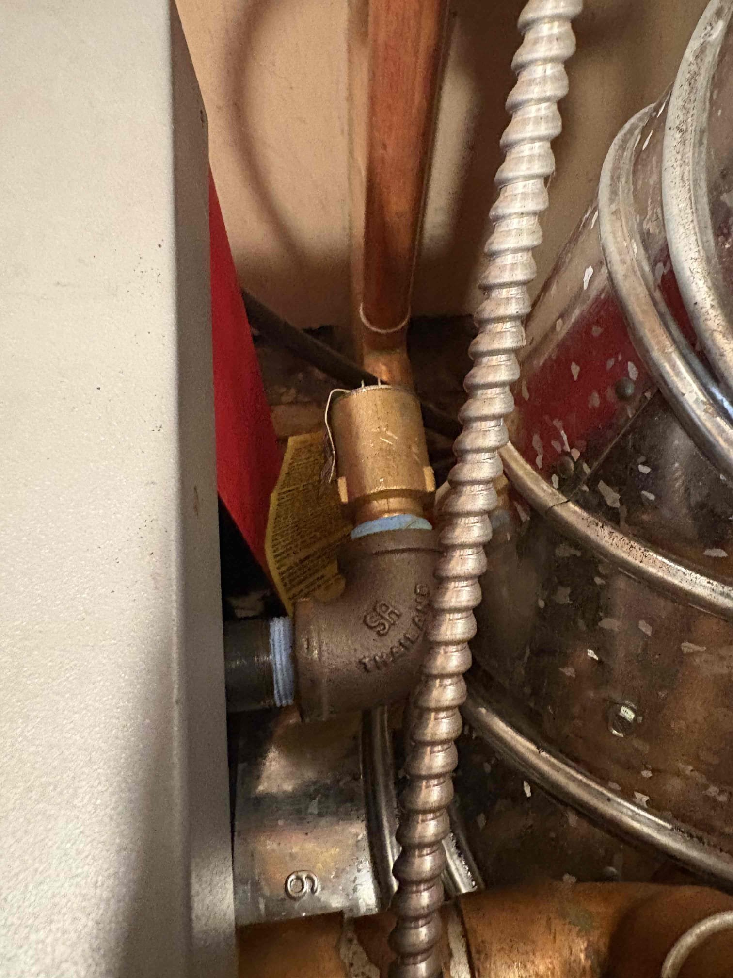 Performed annual maintenance on the Trio oil boiler. Replaced the oil nozzle, fuel filter, and pump strainer. Brushed and vacuumed the heat exchanger and flue pipe. Tested and confirmed the operation of all system safety controls. Verified proper function of all burner components.

Conducted combustion, smoke, and draft tests. During testing, found that the pressure relief valve did not reseal properly. With customer approval, replaced the boiler’s pressure relief valve. Purged air from the system and confirmed that all heating zones are circulating water properly.

Noted that the previously installed nozzle size did not match the manufacturer’s specifications, resulting in off-spec combustion readings. Installed the factory-recommended nozzle and rechecked combustion. Confirmed proper combustion performance and safe operating levels.

System is operating properly at this time.
